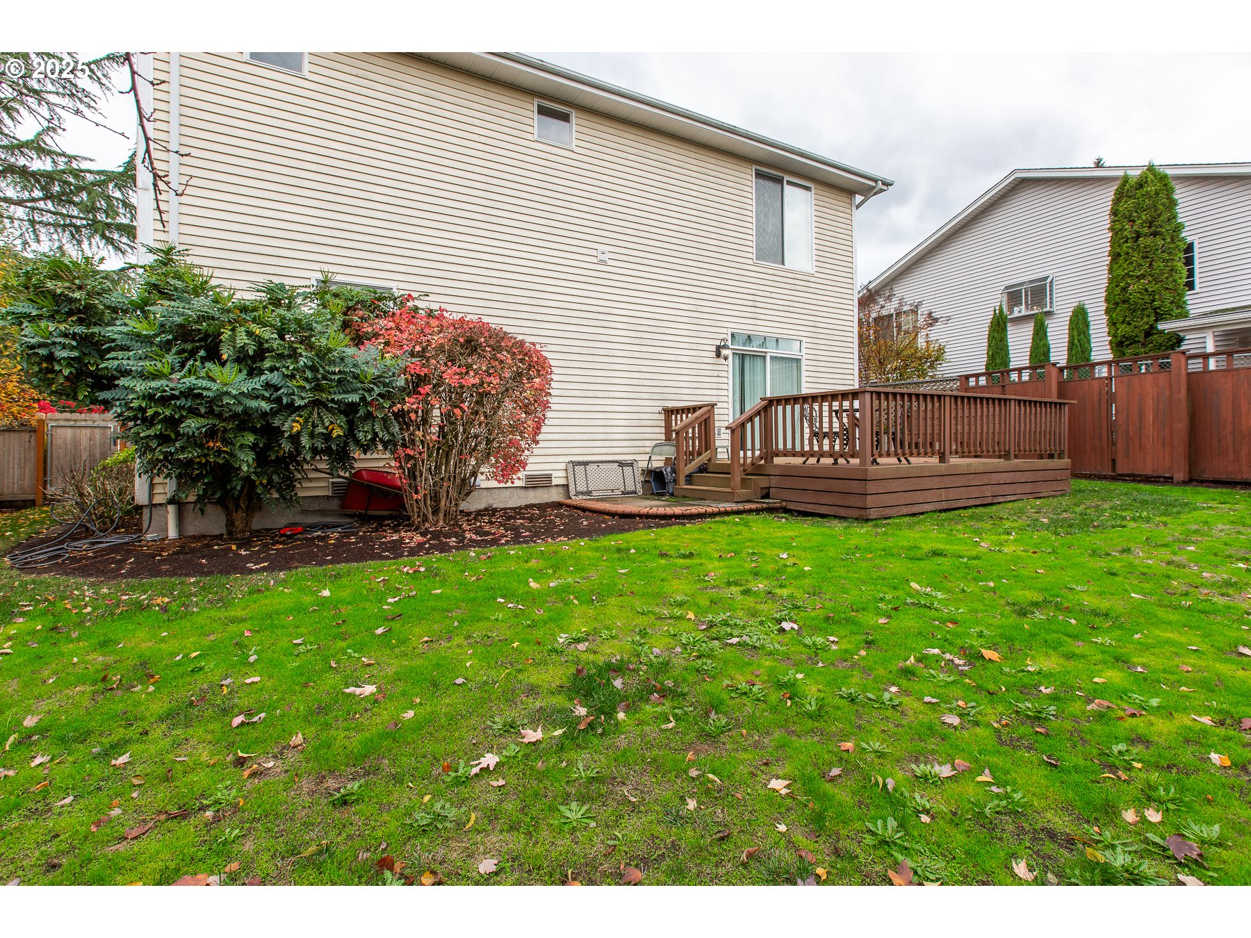 6964 Bluebelle Way Springfield, OR 97478 - Photo 35 of 35 a view of a house with backyard and sitting area
