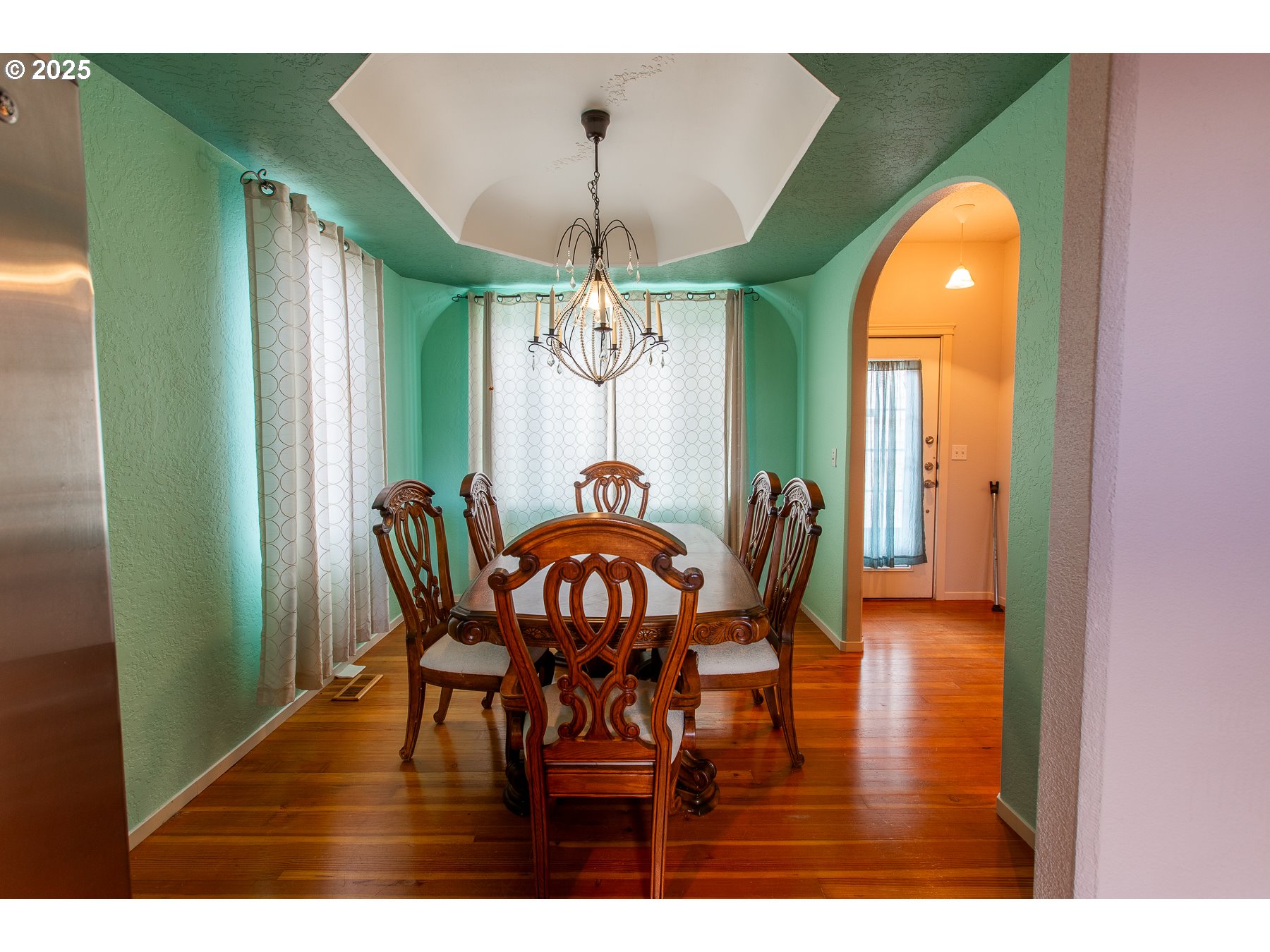 6964 Bluebelle Way Springfield, OR 97478 - Photo 5 of 35 a view of a dining room with furniture and chandelier