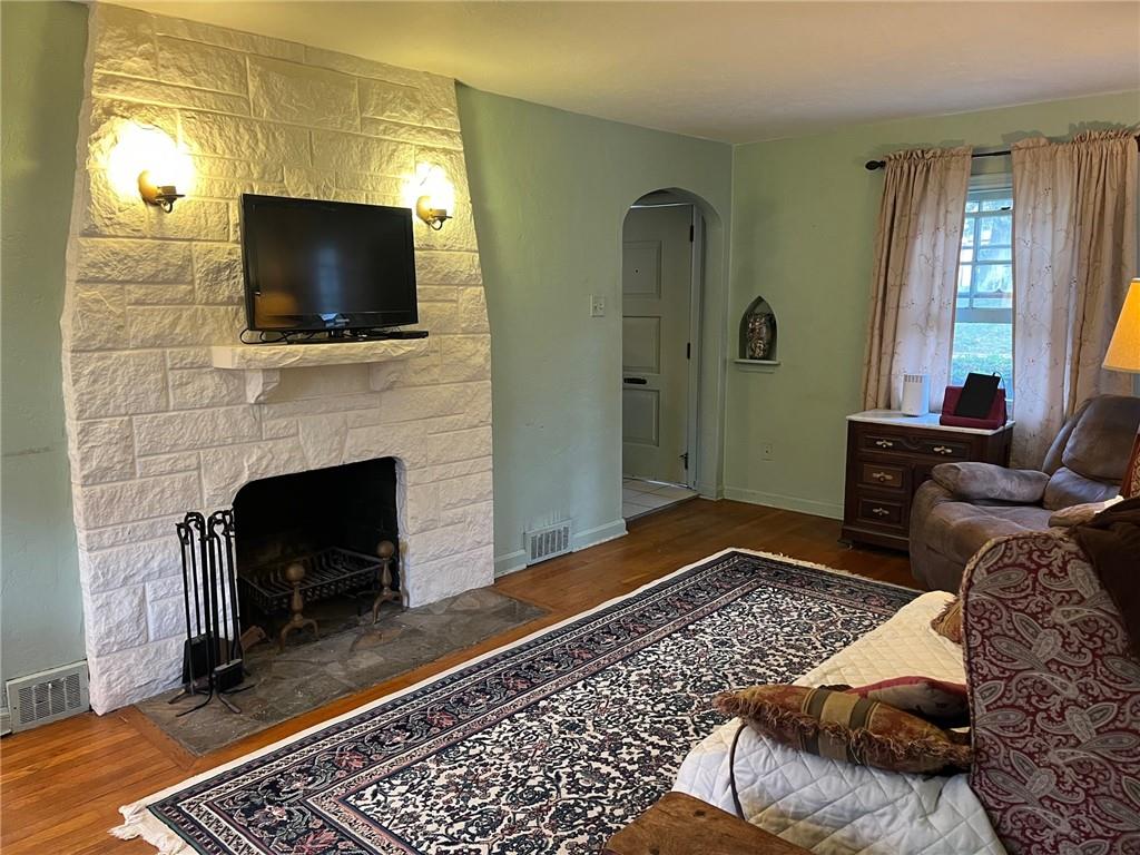 4914 McAnulty Road Pittsburgh, PA 15236 - Photo 3 of 17 a bedroom with a bed and a flat screen tv