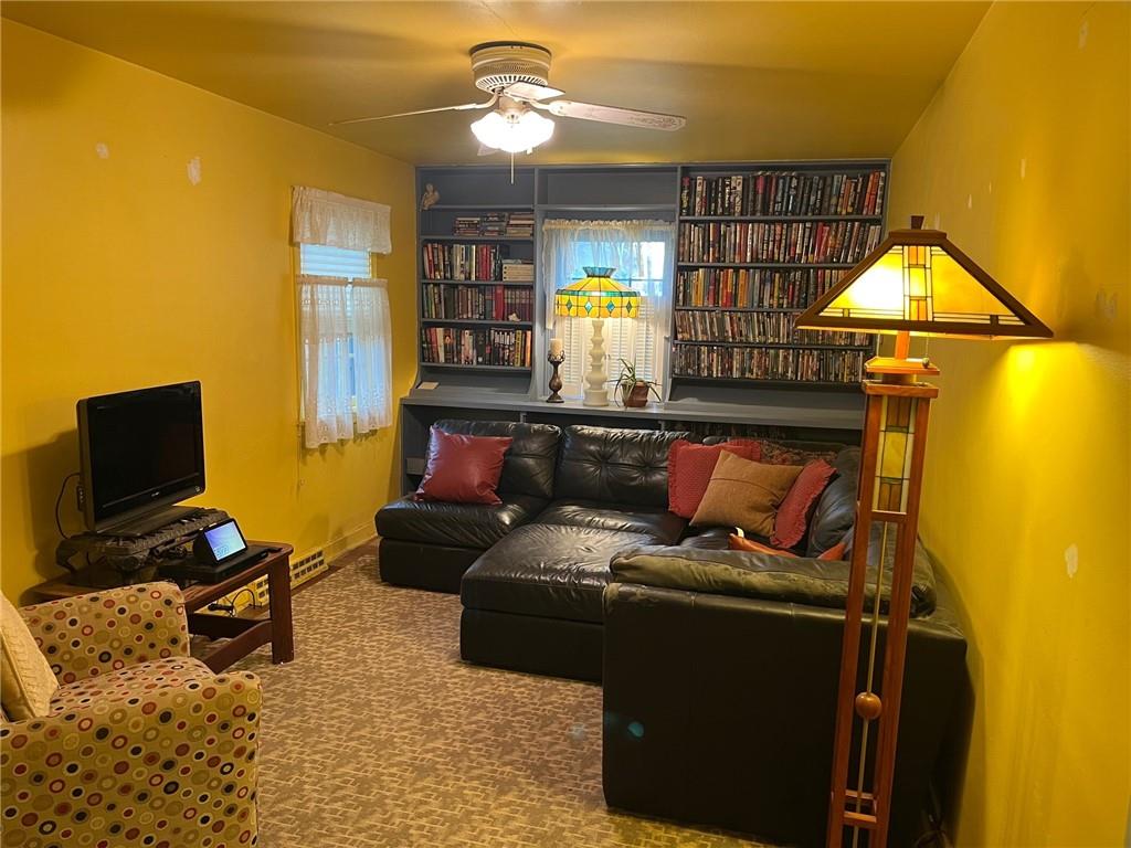 4914 McAnulty Road Pittsburgh, PA 15236 - Photo 5 of 17 a living room with furniture and a window