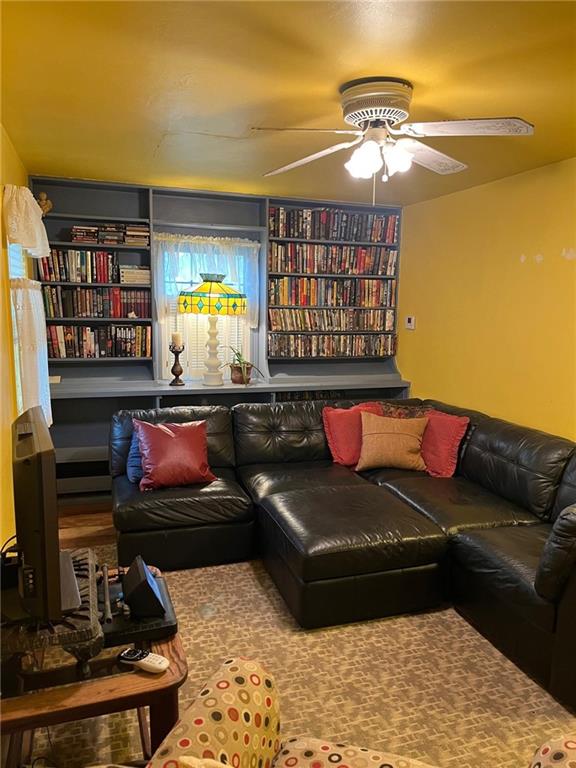 4914 McAnulty Road Pittsburgh, PA 15236 - Photo 6 of 17 a living room with furniture and a flat screen tv