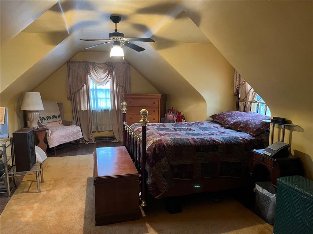 4914 McAnulty Road Pittsburgh, PA 15236 - Photo 7 of 17 a bed room with furniture and a chandelier