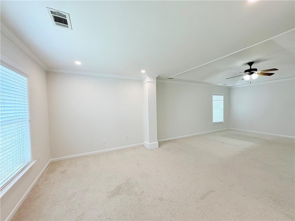 4195 Settlers Grove Road Cumming, GA 30028 - Photo 15 of 38 en empty room with windows