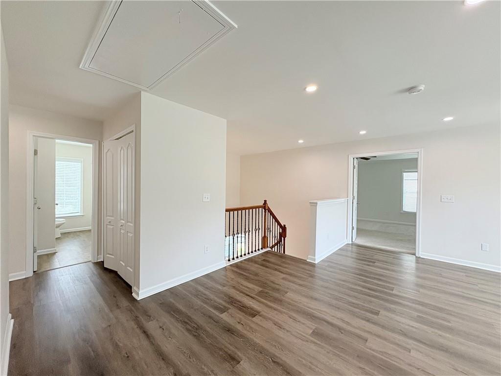 4195 Settlers Grove Road Cumming, GA 30028 - Photo 20 of 38 a view of empty room with wooden floor