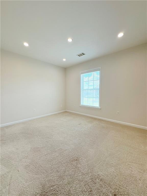 4195 Settlers Grove Road Cumming, GA 30028 - Photo 26 of 38 an empty room with a window