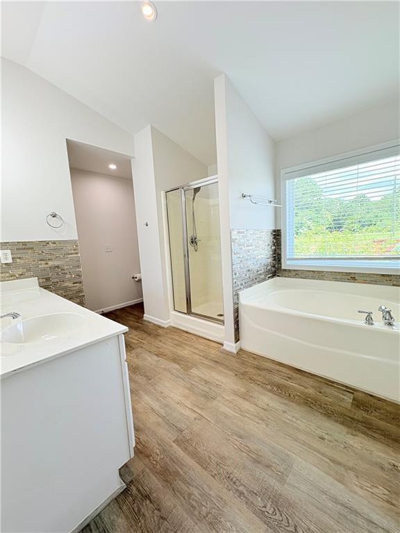 4195 Settlers Grove Road Cumming, GA 30028 - Photo 29 of 38 a spacious bathroom with a tub sink and mirror