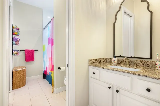 a bed room with a bed and furniture