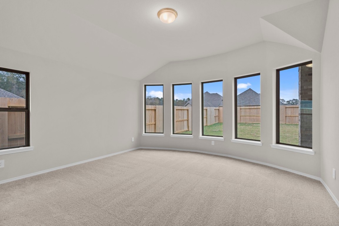 9526 Sierra Crest Lane Porter, TX 77365 - Photo 17 of 39 a view of an empty room with a window