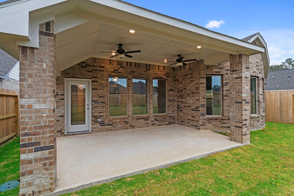 9526 Sierra Crest Lane Porter, TX 77365 - Photo 26 of 39 a view of a building with a outdoor space