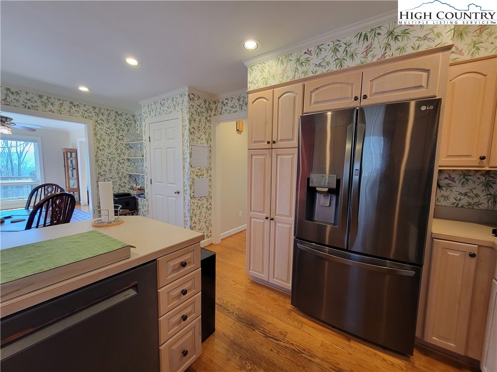272 Maple Ridge Drive Boone, NC 28607 - Photo 14 of 41 a kitchen with stainless steel appliances a refrigerator and a stove