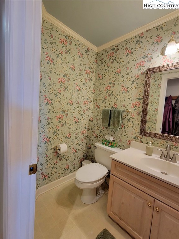 272 Maple Ridge Drive Boone, NC 28607 - Photo 16 of 41 a bathroom with a granite countertop toilet a sink and a mirror