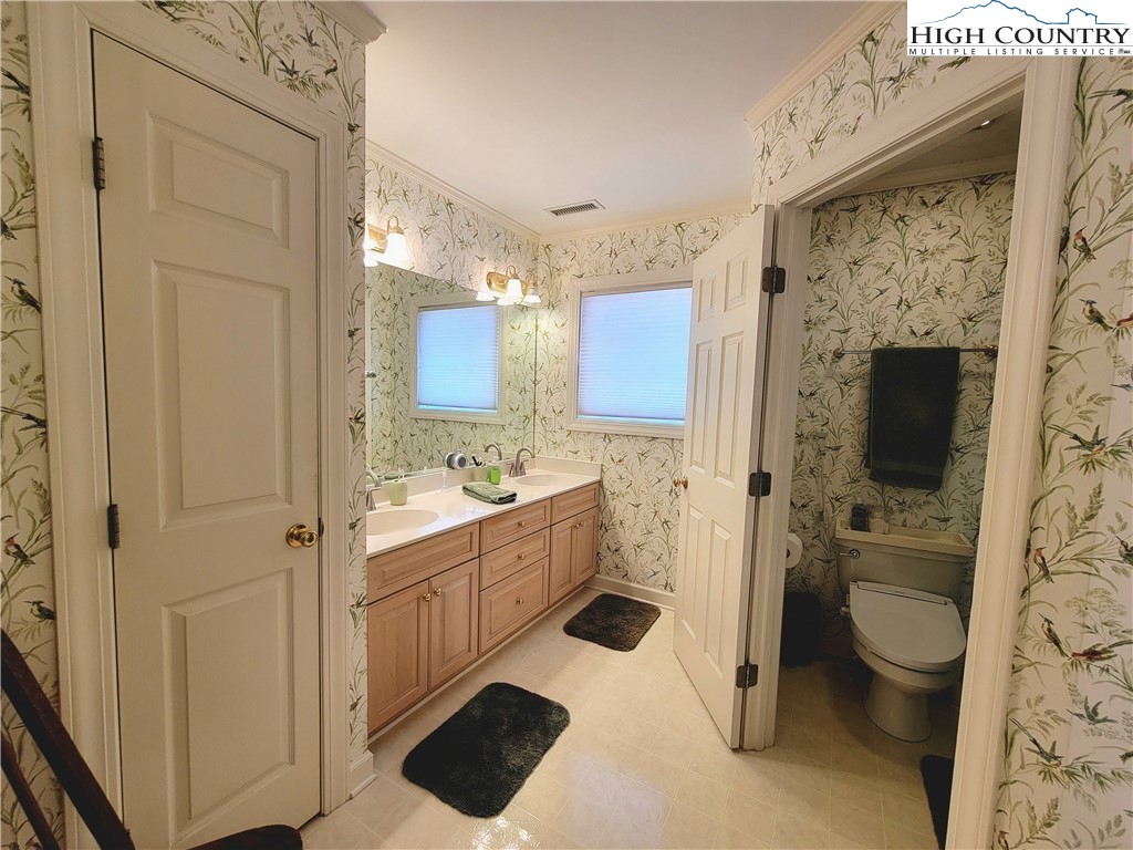 272 Maple Ridge Drive Boone, NC 28607 - Photo 20 of 41 a bathroom with a sink toilet and shower