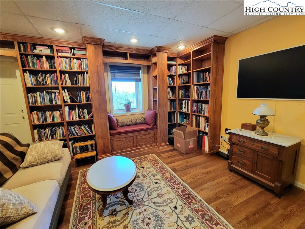 272 Maple Ridge Drive Boone, NC 28607 - Photo 28 of 41 a living room with furniture and a flat screen tv