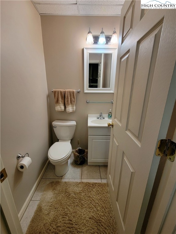 272 Maple Ridge Drive Boone, NC 28607 - Photo 33 of 41 a bathroom with a toilet sink and mirror