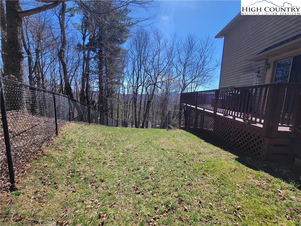 272 Maple Ridge Drive Boone, NC 28607 - Photo 4 of 41 a view of backyard with wooden fence