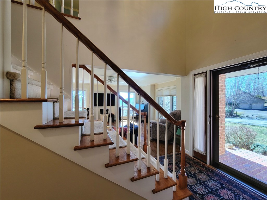 272 Maple Ridge Drive Boone, NC 28607 - Photo 5 of 41 a view of entryway and hall with wooden floor
