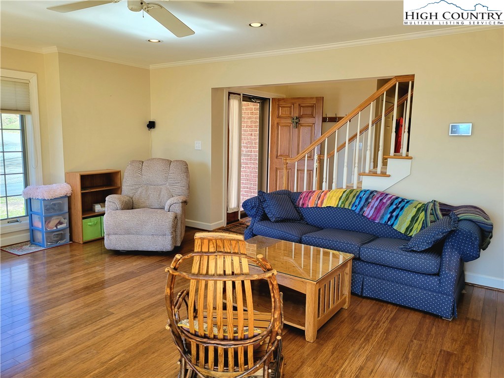 272 Maple Ridge Drive Boone, NC 28607 - Photo 7 of 41 a living room with furniture and a wooden floor