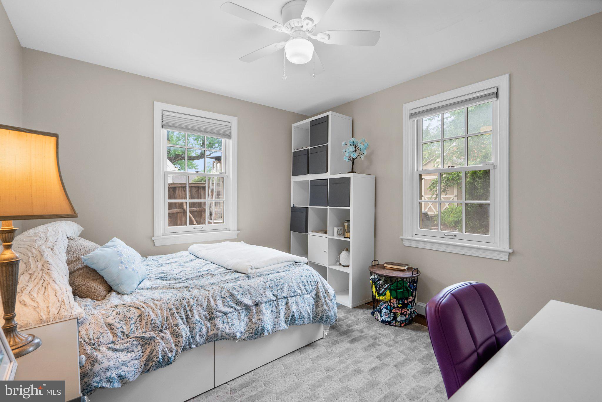 9911 Edgehill Lane Silver Spring, MD 20901 - Photo 12 of 45 a bedroom with a large bed and a window