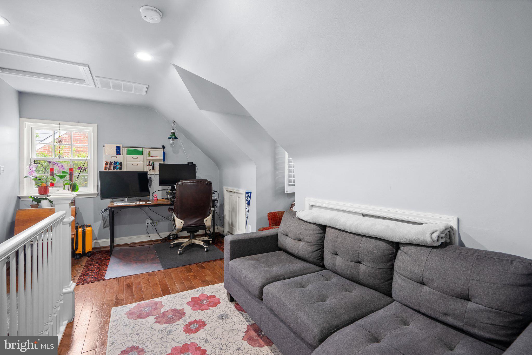 9911 Edgehill Lane Silver Spring, MD 20901 - Photo 18 of 45 a living room with furniture rug and window
