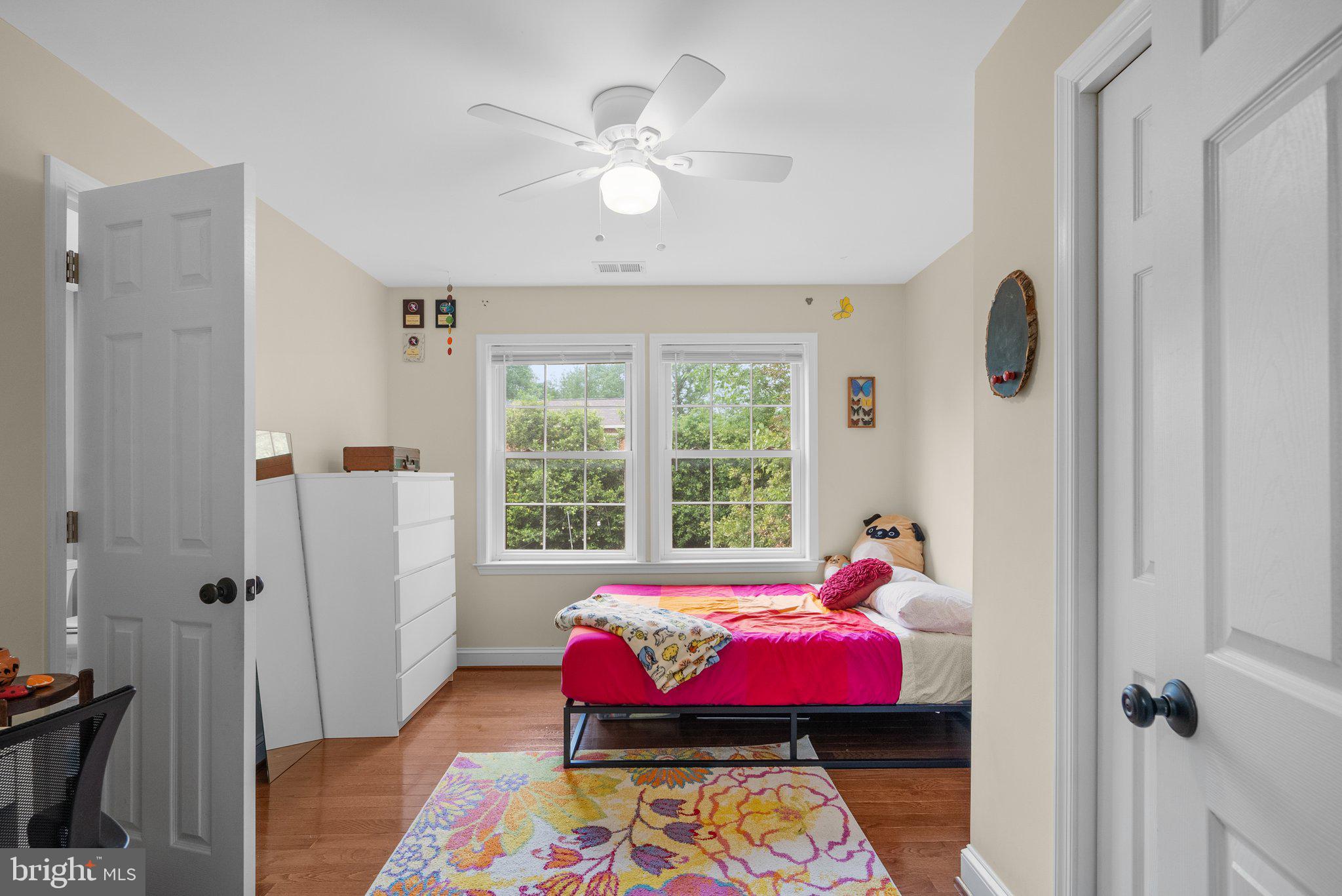 9911 Edgehill Lane Silver Spring, MD 20901 - Photo 19 of 45 a bedroom with furniture and a window