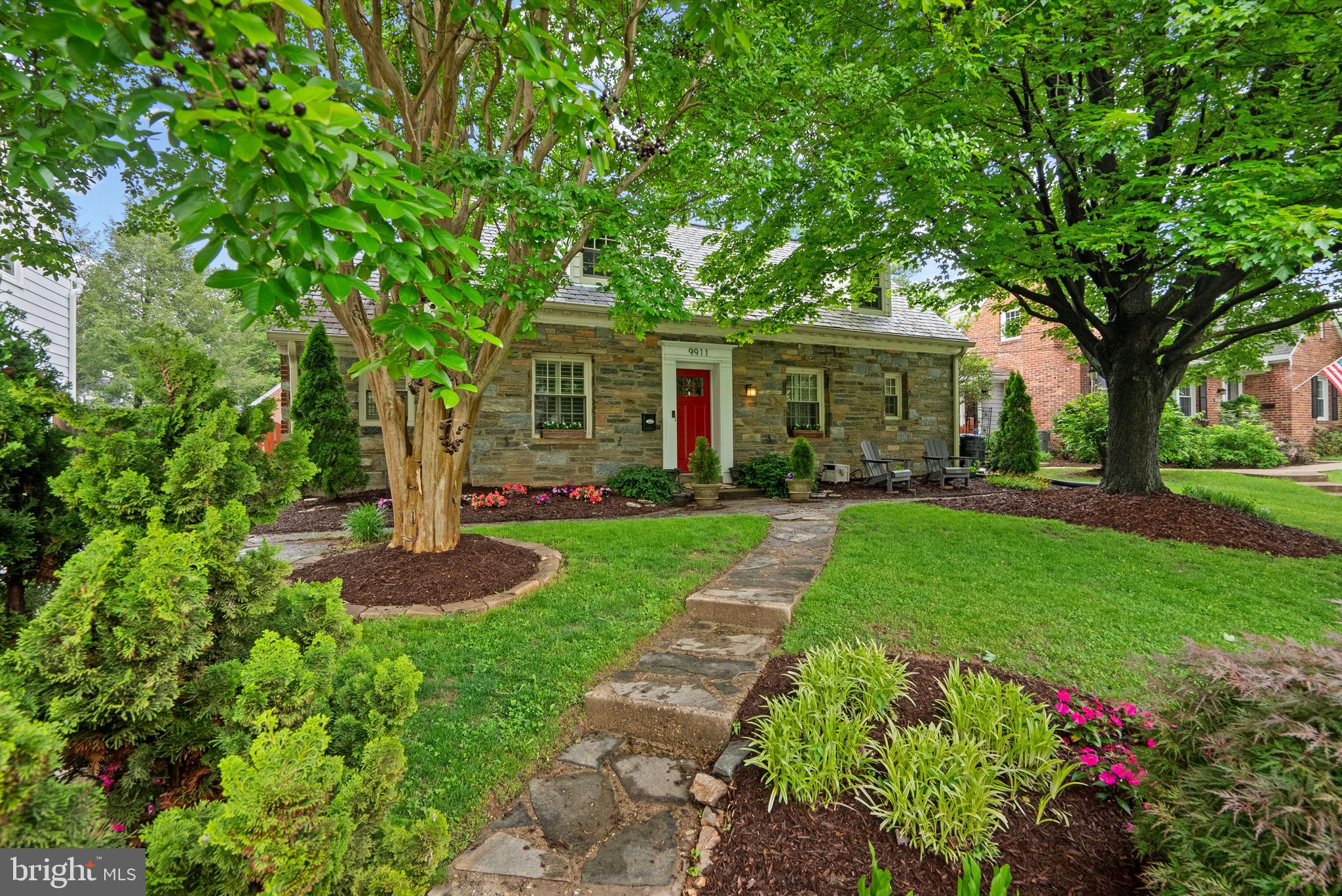 9911 Edgehill Lane Silver Spring, MD 20901 - Photo 2 of 45 a front view of a house with garden