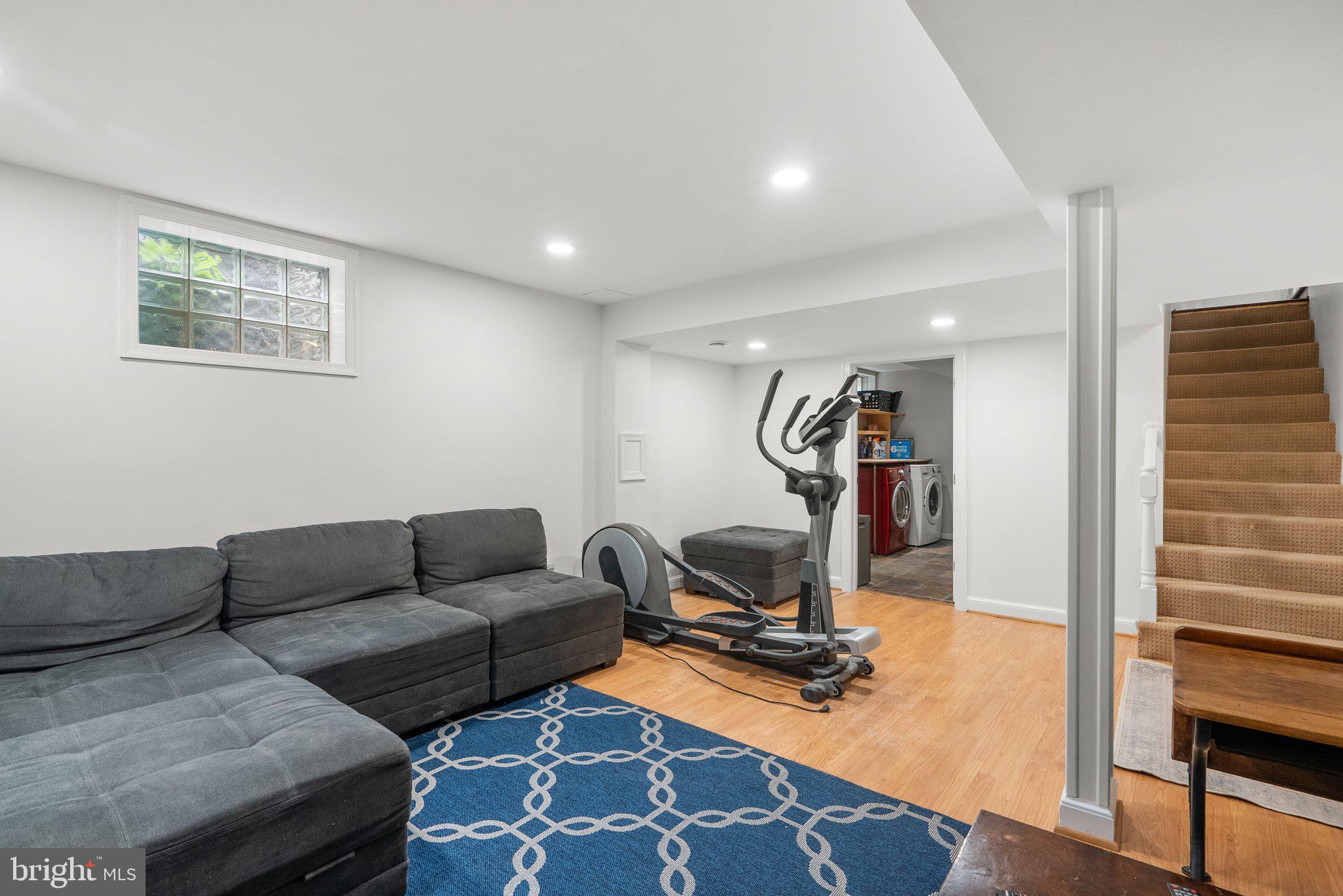 9911 Edgehill Lane Silver Spring, MD 20901 - Photo 28 of 45 a view of a livingroom with workspace and a couch