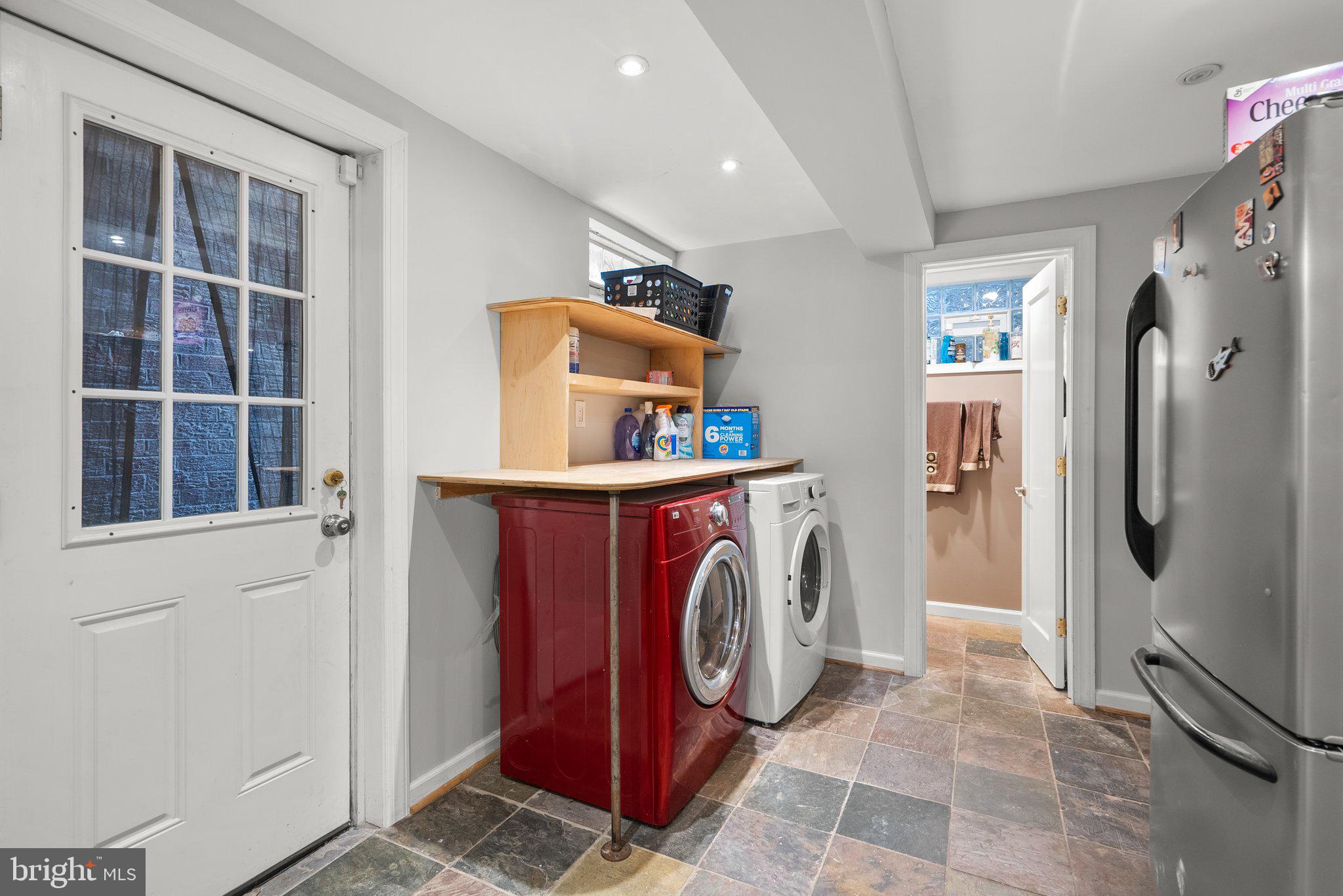 9911 Edgehill Lane Silver Spring, MD 20901 - Photo 29 of 45 a utility room with dryer and washer