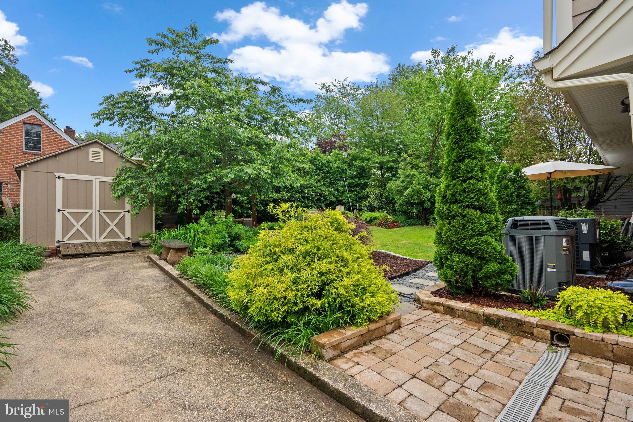 9911 Edgehill Lane Silver Spring, MD 20901 - Photo 33 of 45 a view of a garden with pathway
