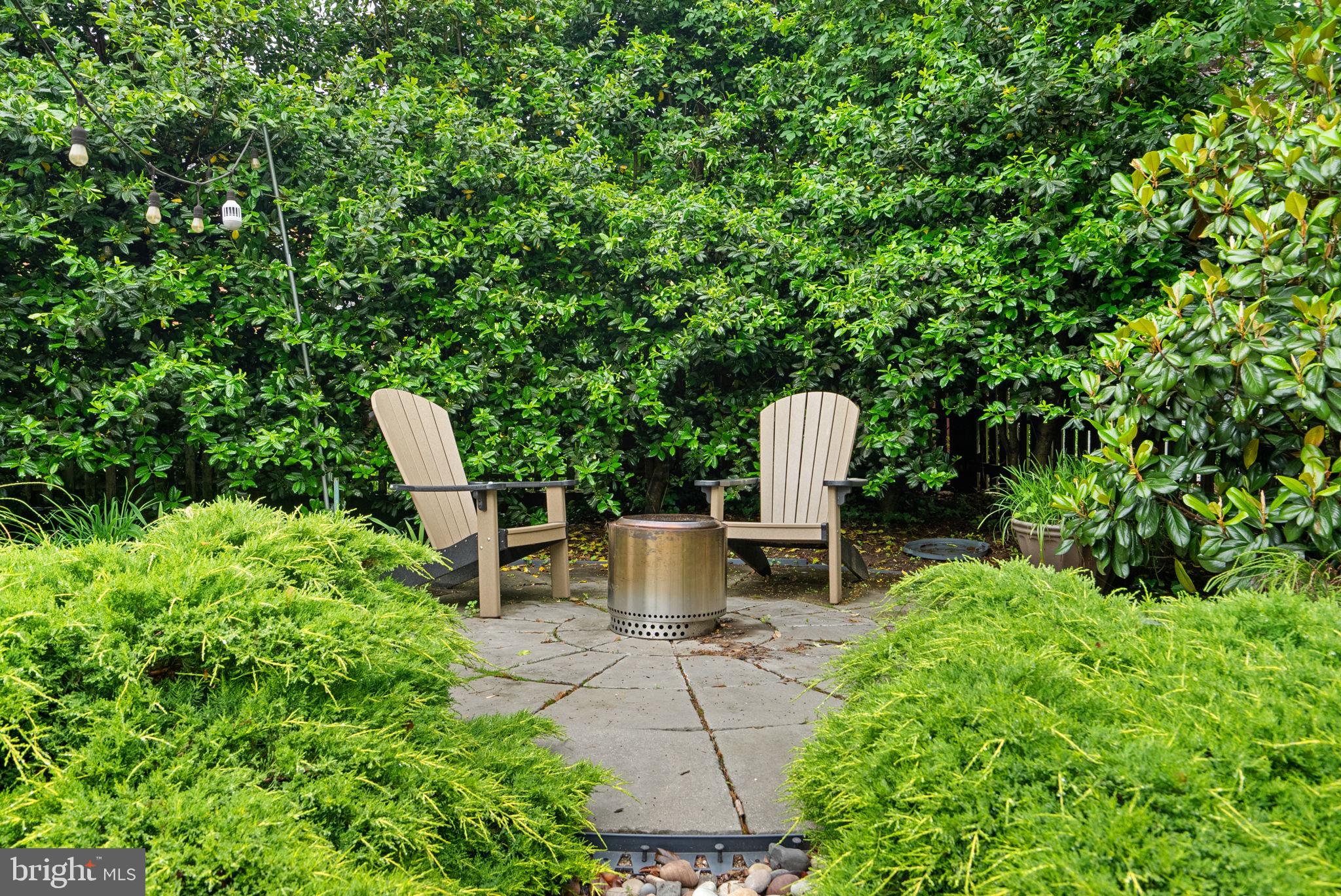 9911 Edgehill Lane Silver Spring, MD 20901 - Photo 36 of 45 a view of a backyard with sitting area