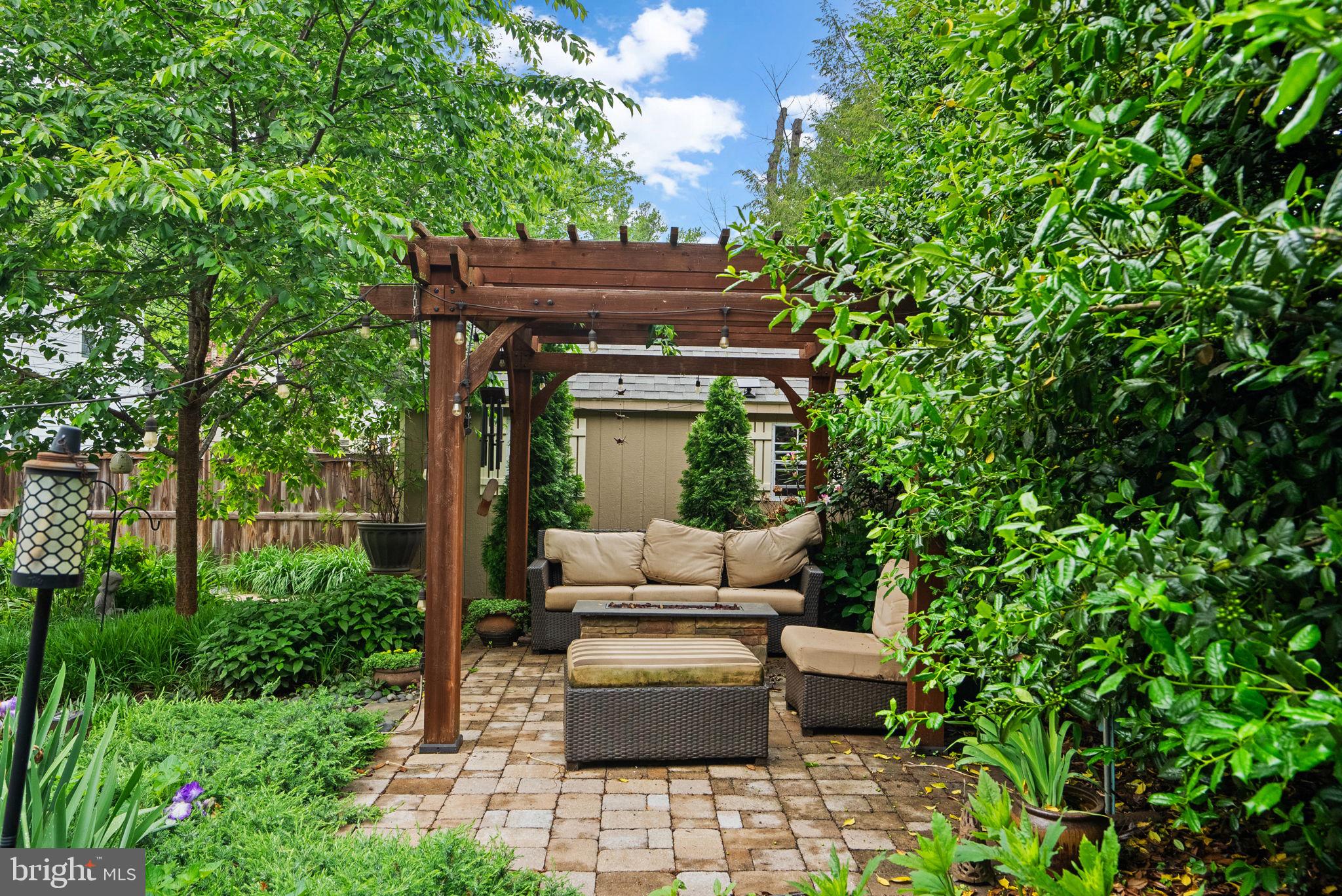9911 Edgehill Lane Silver Spring, MD 20901 - Photo 37 of 45 a view of house with backyard sitting area and garden