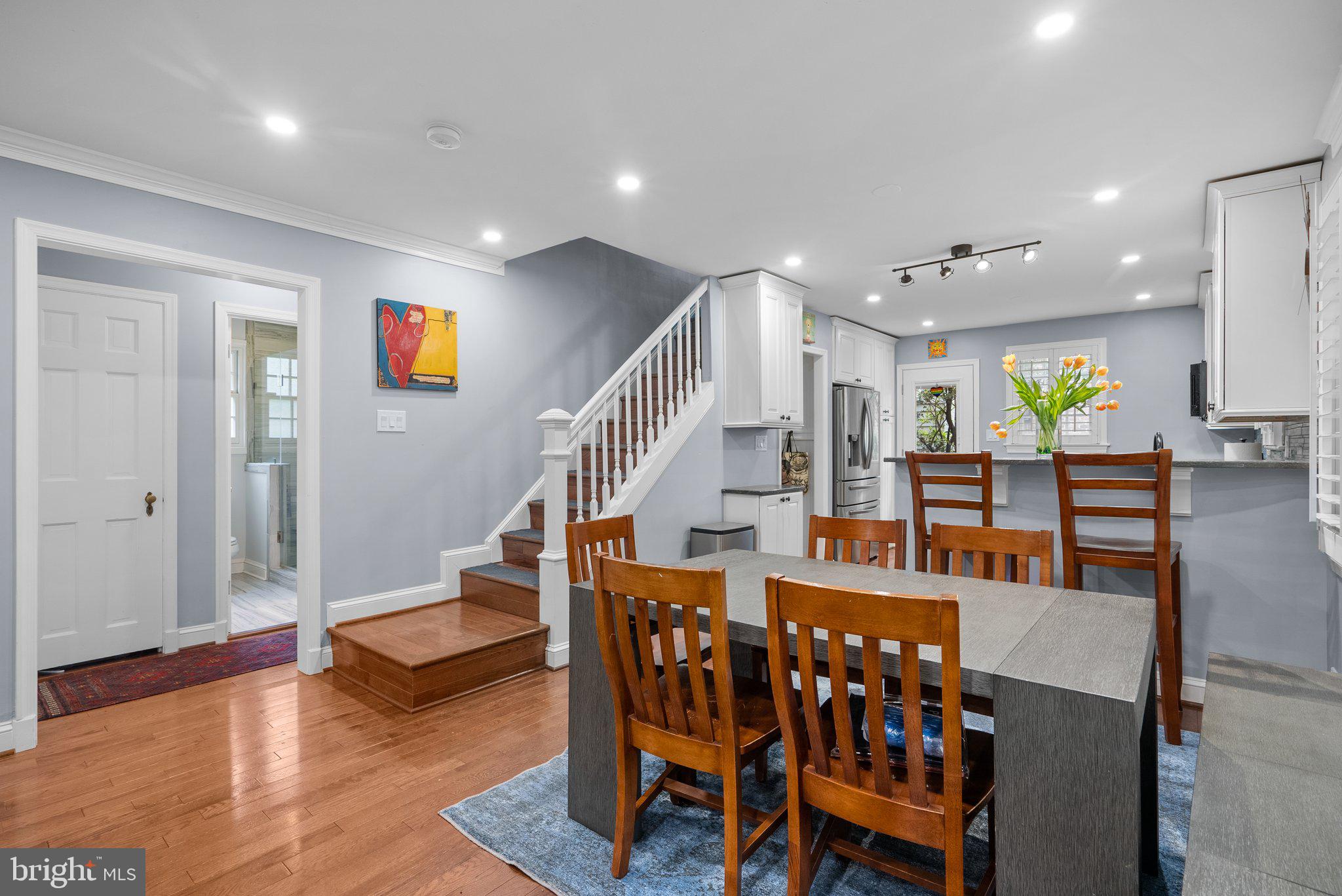 9911 Edgehill Lane Silver Spring, MD 20901 - Photo 7 of 45 a dining room with furniture and wooden floor