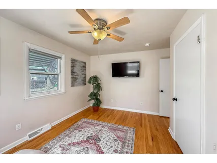 a view of a livingroom with a flat screen tv