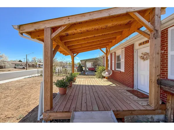 a view of a living room and a patio