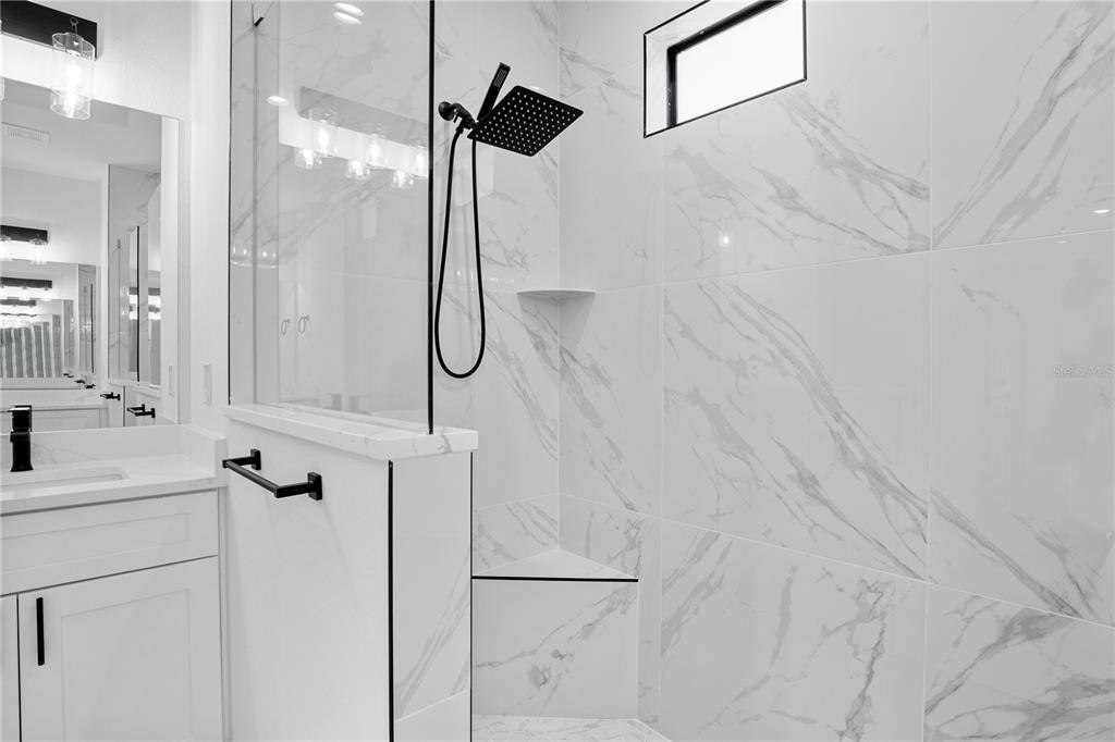 2805 Anniston Road North Port, FL 34288 - Photo 14 of 24 a bathroom with a shower