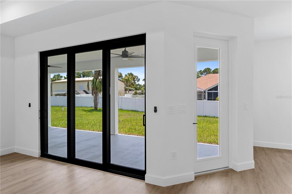 2805 Anniston Road North Port, FL 34288 - Photo 10 of 24 a view of an entryway and livingroom