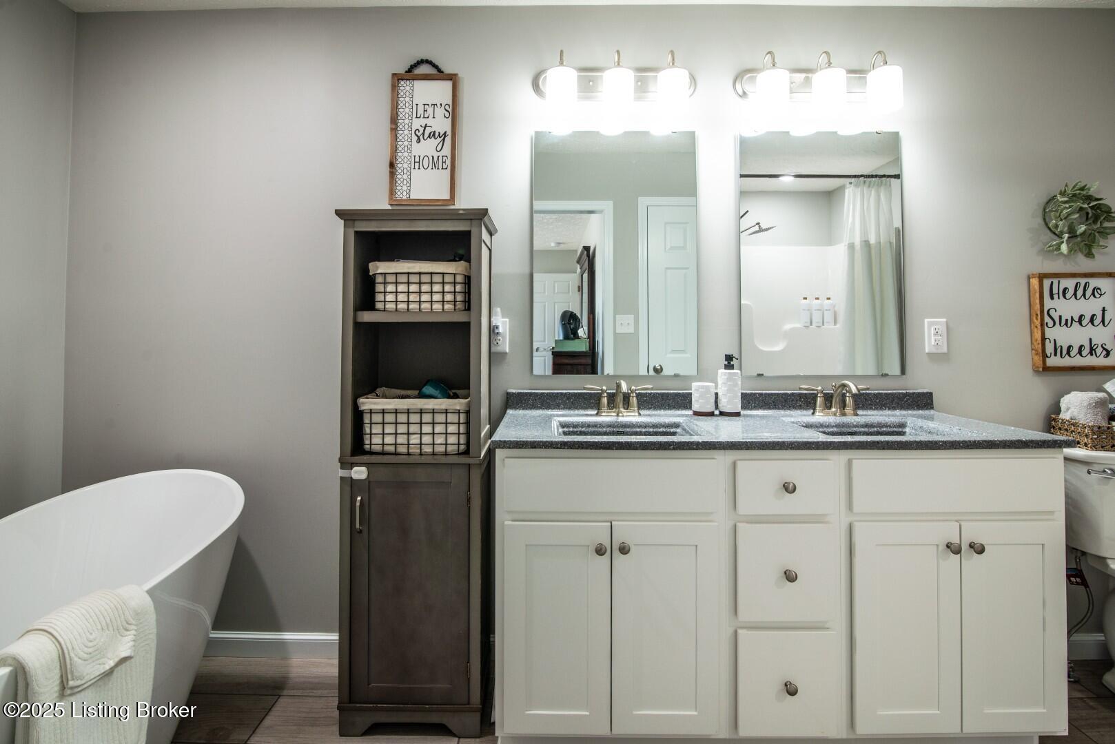 4069 Fairground Road Brandenburg, KY 40108 - Photo 25 of 69 Complete with side by side lighted mirrors along with cabinet and drawer storage