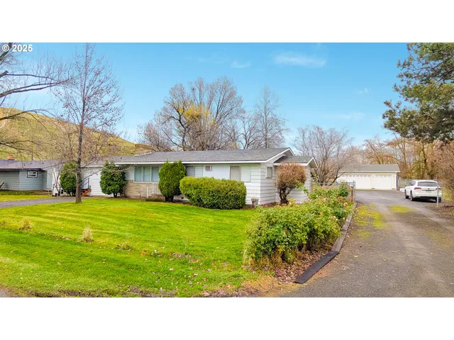 a black and white photo of a house