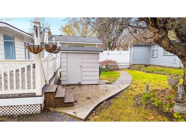 a aerial view of a house with swimming pool and porch
