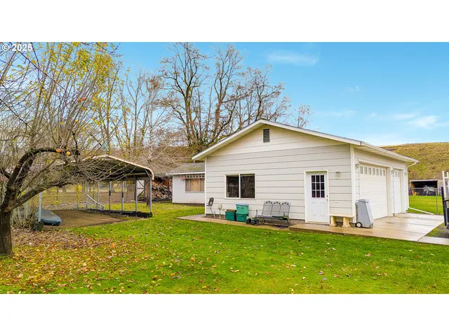 a black and white photo of a house