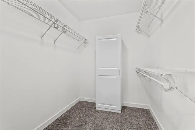 a view of a room with racks on the wall