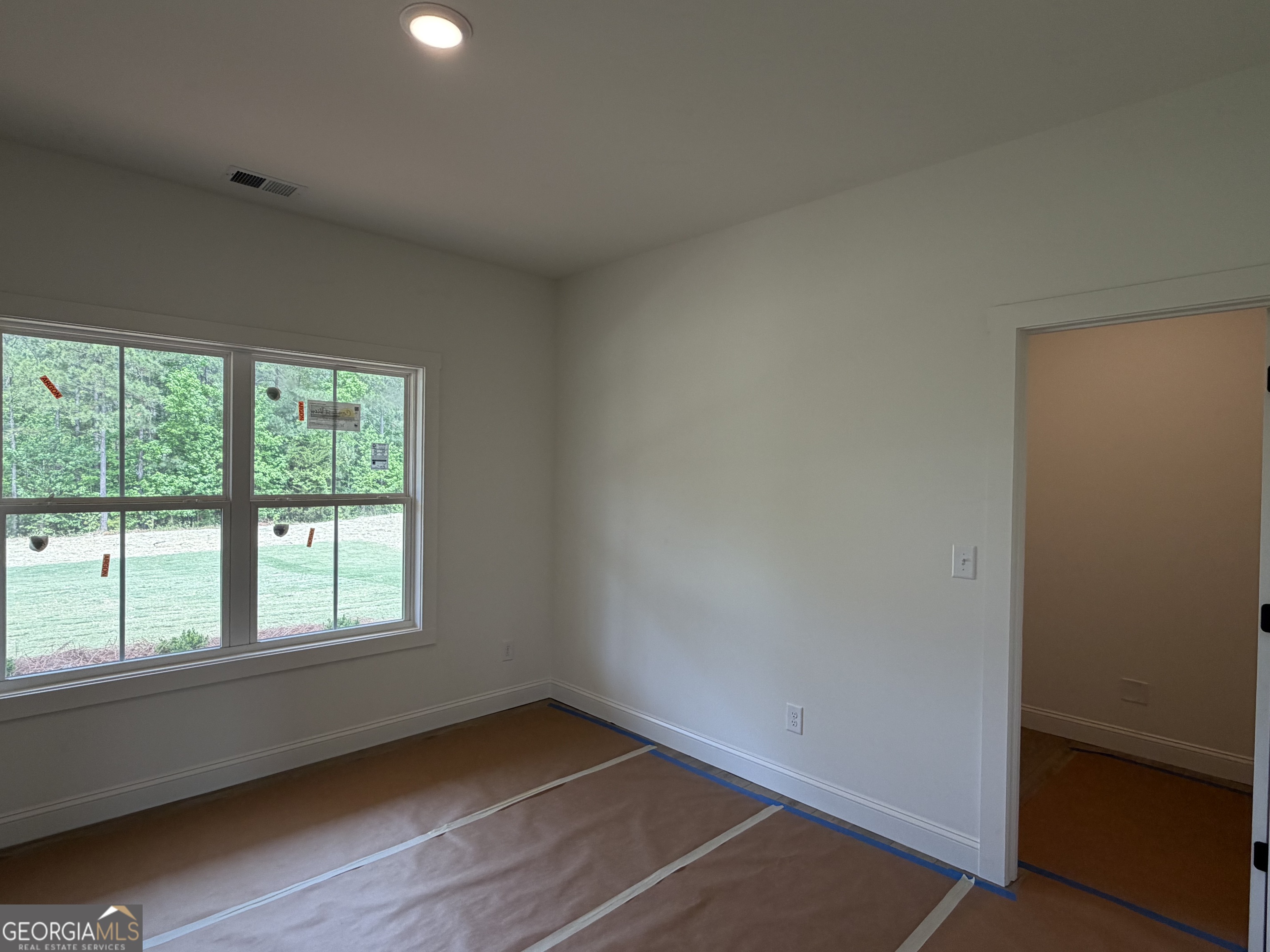 733 Pine Grove Culloden, GA 31016 - Photo 20 of 25 a view of an empty room with a window