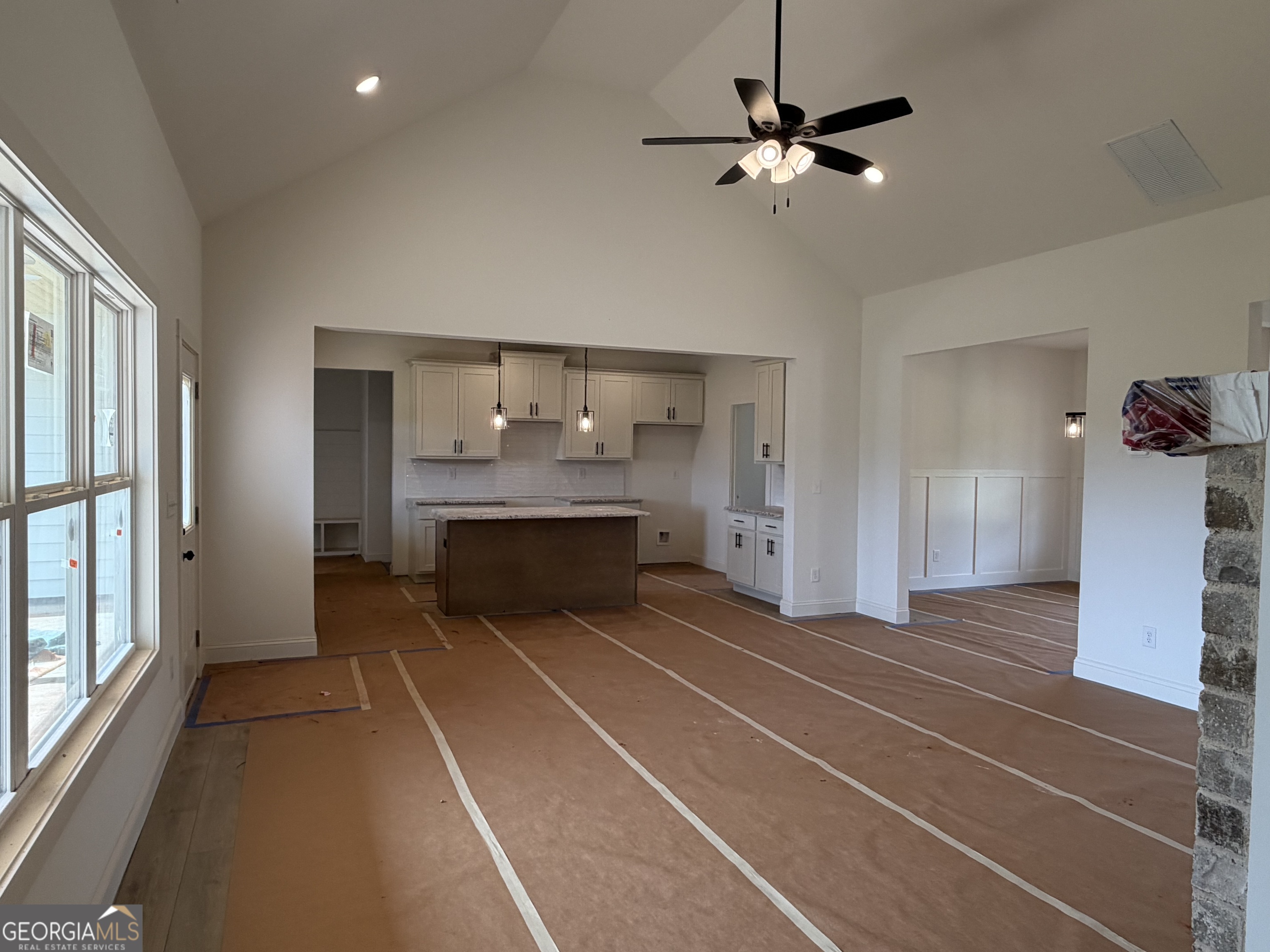 733 Pine Grove Culloden, GA 31016 - Photo 4 of 25 a view of an empty room with a window and a ceiling fan