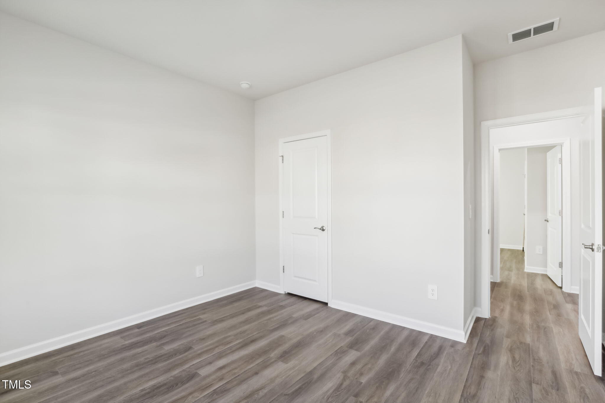 185 White Birch Lane Angier, NC 27501 - Photo 14 of 27 a view of a room with wooden floor