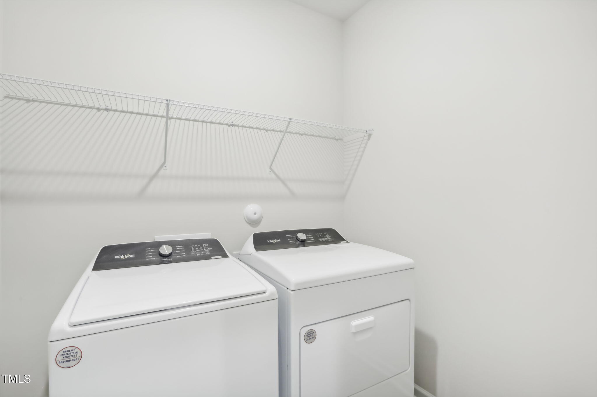 185 White Birch Lane Angier, NC 27501 - Photo 25 of 27 a utility room with dryer and washer