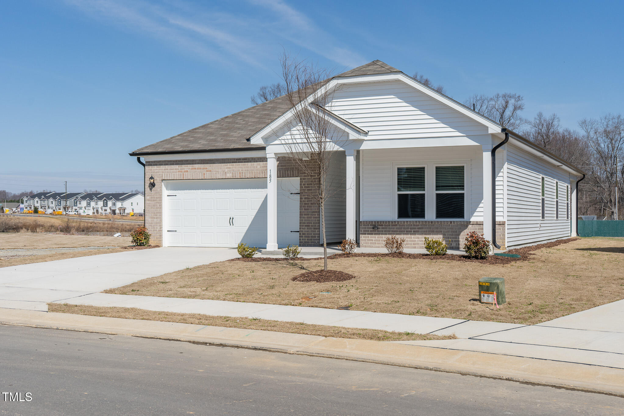 185 White Birch Lane Angier, NC 27501 - Photo 2 of 27 a view of a house with a patio and yard
