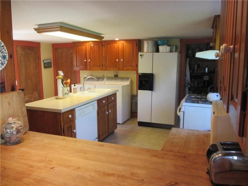 33 Pond Road Truro, MA 02666 - Photo 7 of 28 a kitchen with a sink and a stove top oven