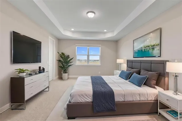 a view of empty room with wooden floor and window