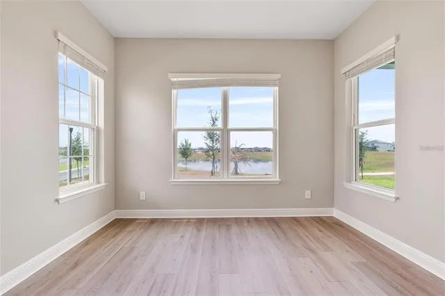 a utility room with sink dryer and washer