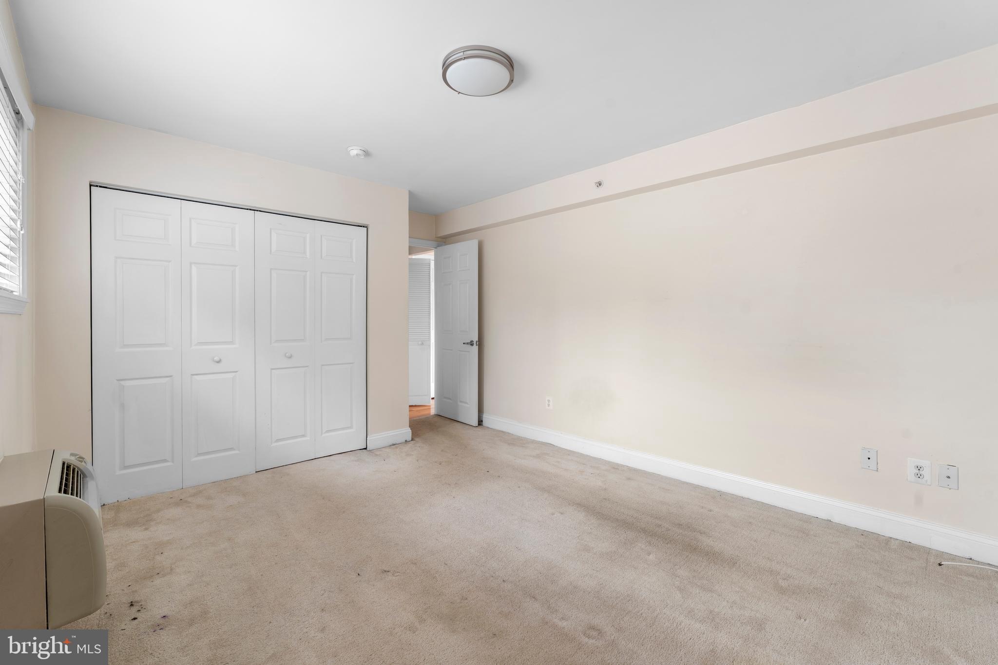 610 Main Street, Unit 511 Laurel, MD 20707 - Photo 17 of 30 an empty room with a empty space