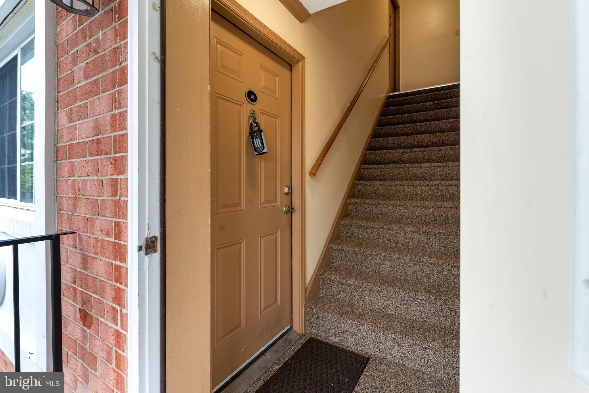 610 Main Street, Unit 511 Laurel, MD 20707 - Photo 4 of 30 a view of an entryway with staircase